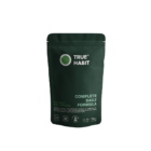 Green True Habit Complete Daily Formula pouch with branding, product name, and icons for plant-based, 83 ingredients, science-based, and laboratory tested