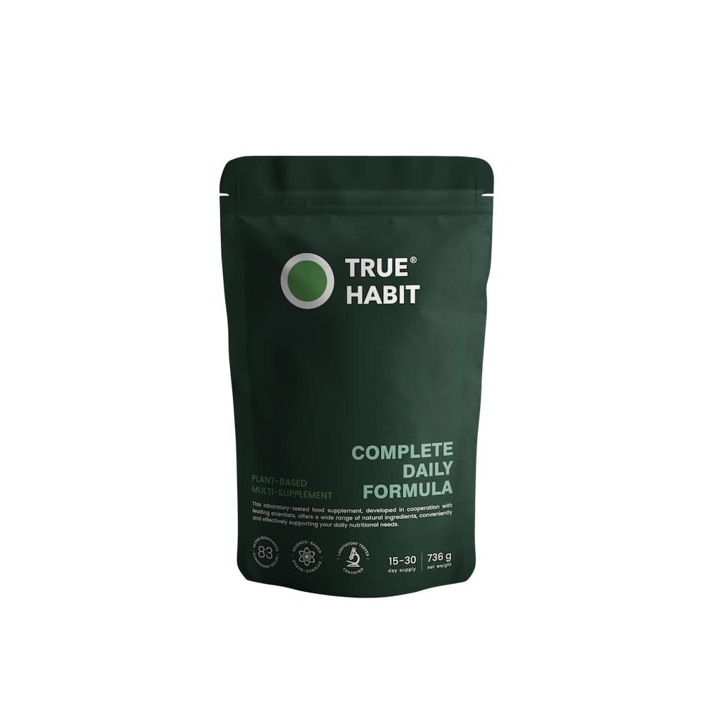 Green True Habit Complete Daily Formula pouch with branding, product name, and icons for plant-based, 83 ingredients, science-based, and laboratory tested